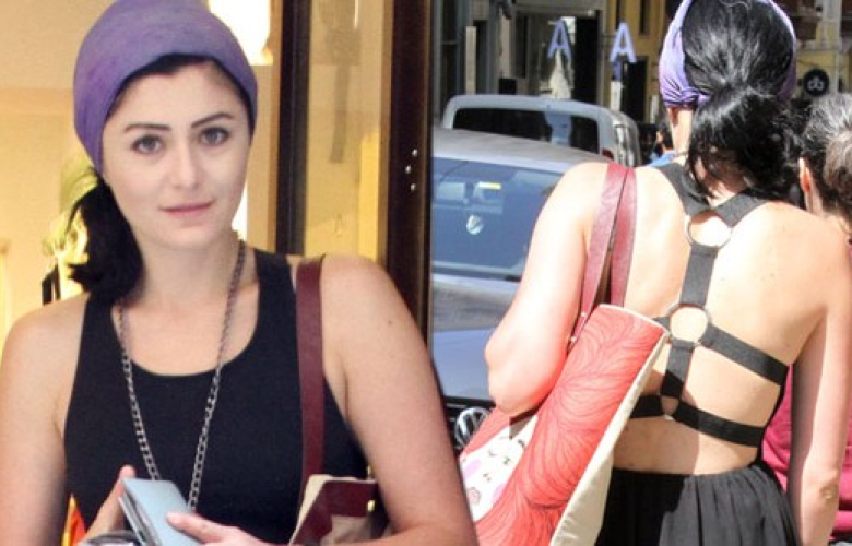 Deniz Çakır, derin dekoltesiyle Galata'da rehberlik yaptı. 